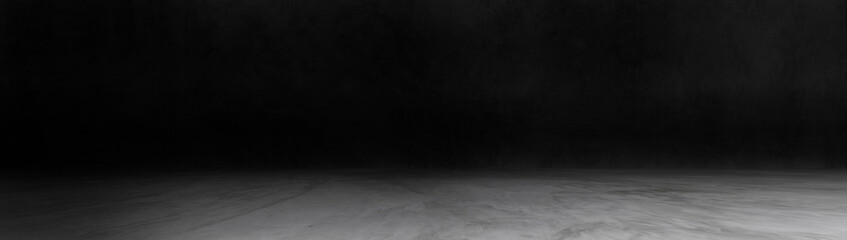 Panorama of concrete wall and floor with spot light and shadow backgrounds, dark room, use for product display for presentation and cover banner design.