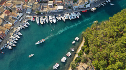 Aerial drone photo of iconic port of Gaios a natural fjord bay ideal for safe anchorage in island of Paxos, Ionian, Greece