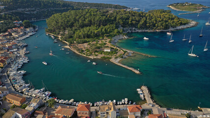 Aerial drone photo of iconic port of Gaios a natural fjord bay ideal for safe anchorage in island of Paxos, Ionian, Greece