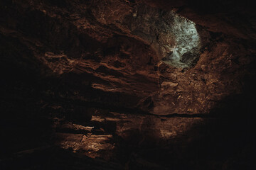 Dark, colorfulTextures of the walls in a lava tube of Canaria island