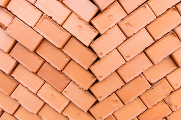 Red and orange brick wall. Brick texture, close up