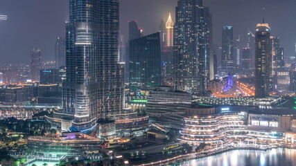 Fototapeta na wymiar Aerial view of Dubai city all night timelapse in downtown.