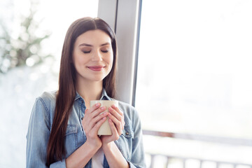 Photo of young attractive girl happy positive smile enjoy morning hot coffee self-isolation quarantine indoors