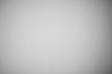 Gray concrete blur for interior design. Intended to use a program to blur the grey cement walls and darken the edges of the image for the background. White plastered concrete wall.