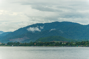 Mekong river with fog and mountain background.