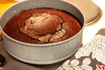 closeup of homemade chocolate cake in a cake tin