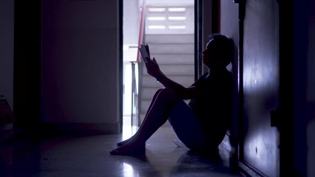 Silhouette of a Man having a lot of financial problems with invoices and Credit Cards, Money concept, real estate, problems, Stress, violence.