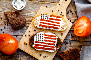 Two homemade sandwiches with image of american flag.