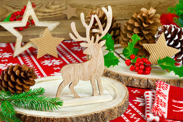 Natural wooden Christmas decoration with reindeer and fir branches