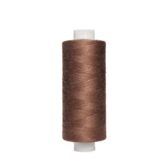 Spool of brown sewing thread isolated on white