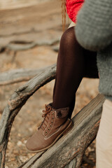 female legs in warm tights closeup autumn walk