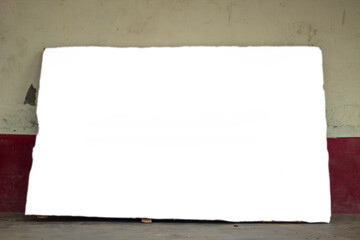 a white blank signboard Leaning against the wall. To advertise by writing any text or design