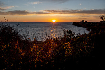 The sun at sunset on the sea
