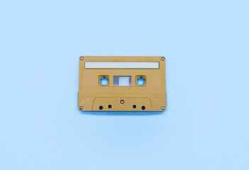 yellow tape cassette on blue background