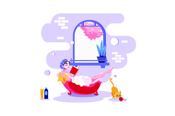Woman relaxing in bubble bath reading book