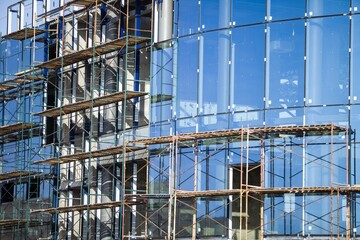 A new apartment block,Tall building under construction with scaffolds,Construction Site