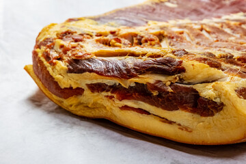 Traditionally smoked bacon. Meat and pork. Kitchen, gastronomy and cooking.