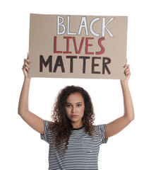 African American woman holding sign with phrase Black Lives Matter on white background. Racism...