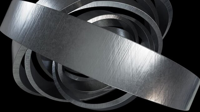 Abstract looping 3D animation of the rotating scratched steel rings rendered in UHD with alpha matte