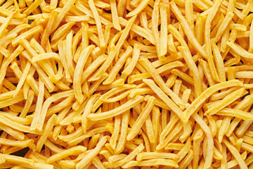 Heap of french fries as background