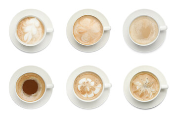 Set with cups of tasty aromatic coffee on white background, top view