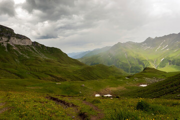 Fototapeta na wymiar Weisstannen Valley at Foo Pass, along Via Alpina long distance walking trail across Switzerland.
