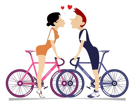 Young man and woman on the bikes fall in love.
Love couple rides bikes and kissing isolated on white
