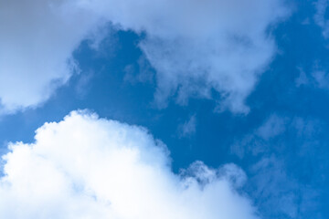 Cloudy blue sky on a clear sunny day. Sky with white clouds