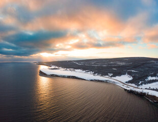 Stormy sunset over the coastline in winter