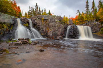 Waterfalls surrounded by autumn colors 