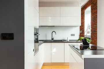 Small kitchen in white and grey colors