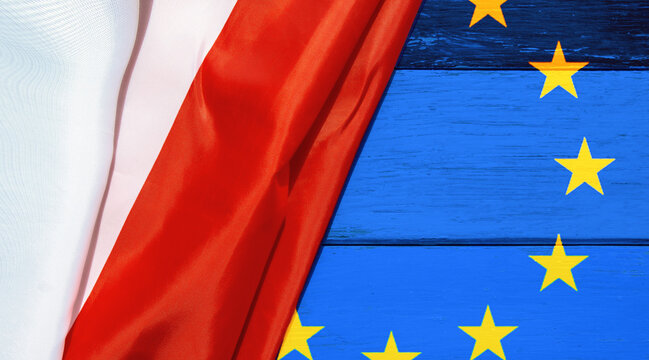 cracked concrete wall with flag of EU europe union and Poland texture - concept for relations between countries, polexit, agreement, conflict, political tension