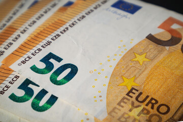 50 euro banknotes close up. Soft focus