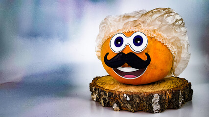 a funny pumpkin in a medical cap on his head and a mustache stands on a round wooden podium....