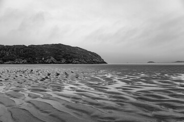 Monochrome sand patterns on the beach