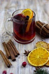 glasses with mulled wine on a wooden background. new year concept