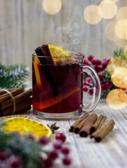 glasses with mulled wine on a wooden background. new year concept