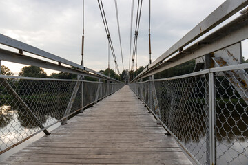 Suspended cable-stayed bridge