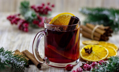 glasses with mulled wine on a wooden background. new year concept