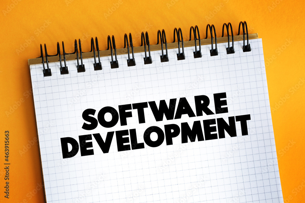 Poster software development text on notepad, concept background.