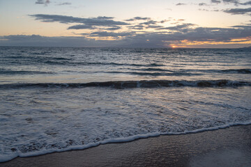 Summer vacation at a tropical beach. Paradise beach with sand and clear water of the sea. Ocean beach background.