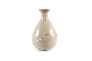 Antique Japanese Kintsugi, beige Kintsugi vase restored with gold cracks. Wabisabi pottery