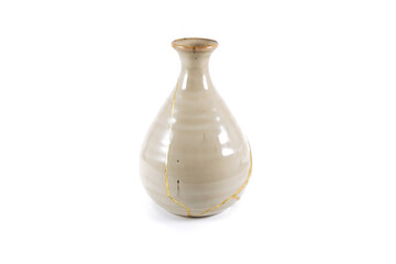 Antique Japanese Kintsugi, beige Kintsugi vase restored with gold cracks. Wabisabi pottery