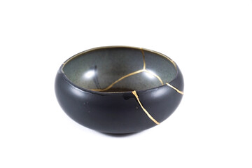 Antique Japanese Kintsugi, brown and black Kintsugi bowl restored with gold cracks. Wabisabi pottery