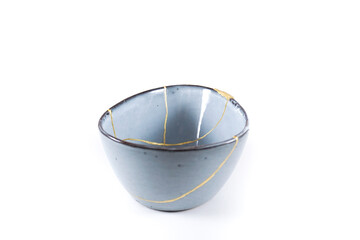Antique Japanese Kintsugi, light blue Kintsugi bowl restored with gold cracks.