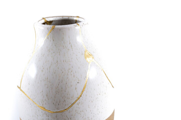 Japanese Kintsugi vase restored with real gold, gold cracks