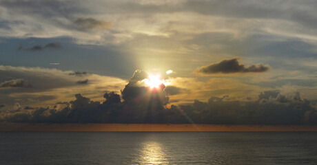 Naklejka na ściany i meble Enchanting sunrise on the Caribbean Sea