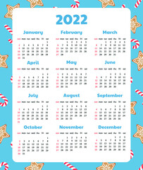 Calendars for 2022 with Christmas background. Gingerbread Cookie and lollypop.
