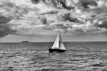 Black-white seascape. Sail to the sea.