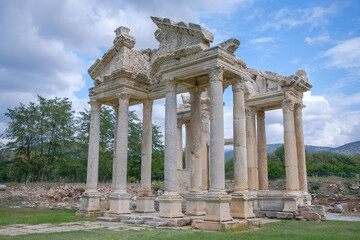 Fototapeta premium Afrodisias (Aphrodisias) Ancient city in Karacasu - Aydin, Turkey. Tetrapylon Gate of Aphrodisias ancient city. The most famous of cities called Aphrodisias.